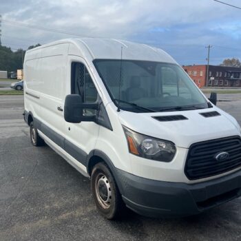 White cargo van parked outside