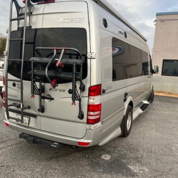 Silver van needing collision repair