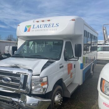 Damaged shuttle bus front collision
