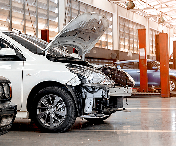 Car undergoing collision repair service